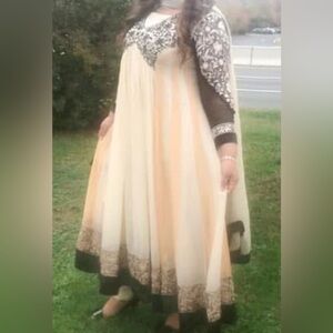 Pakistani original thread and motifs Emboridry Cream and Black Dress
